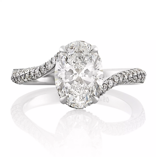 PIEGA - 18ct white gold oval and round brilliant cut pave set diamond ring