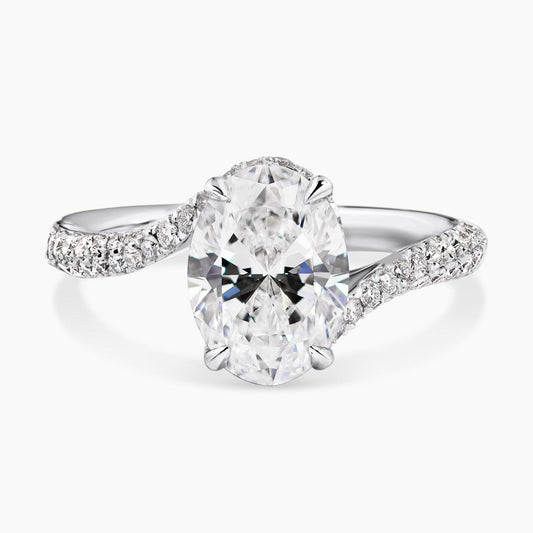 PIEGA - 18ct white gold oval and round brilliant cut pave set diamond ring