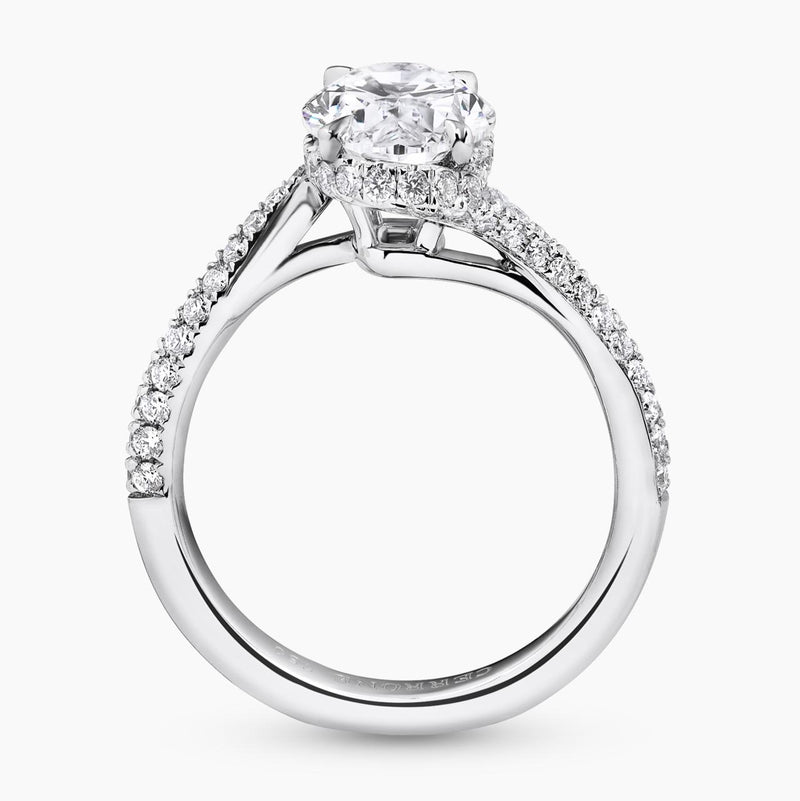 18ct white gold oval and round brilliant cut pave set diamond twist ring side profile