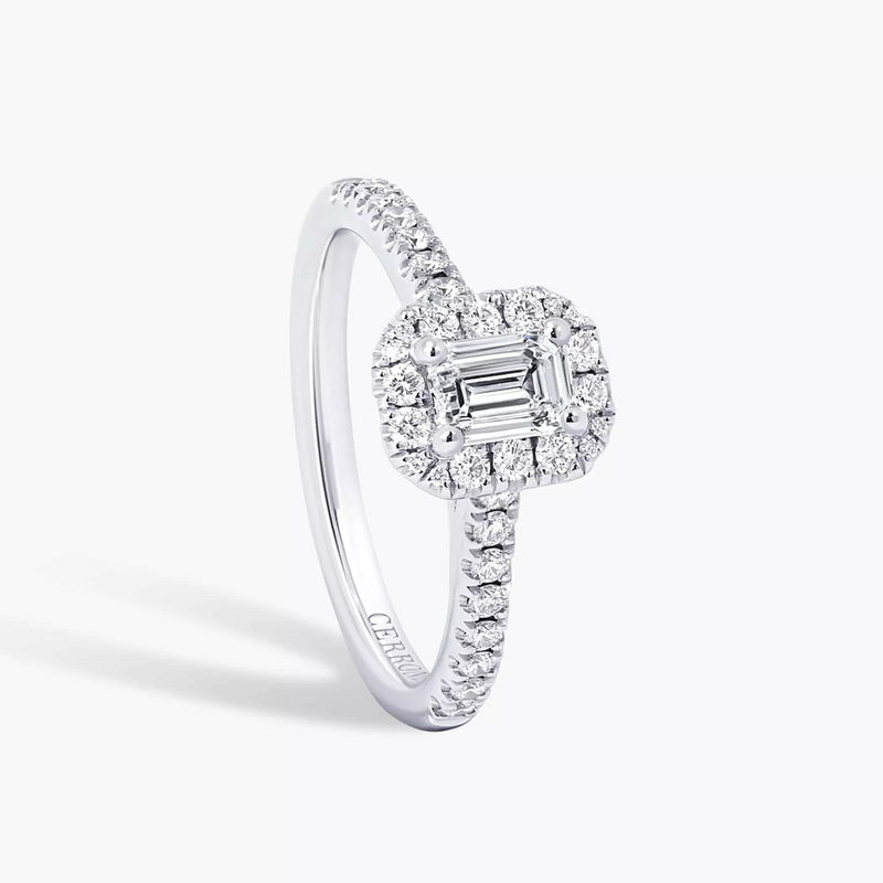 18ct white gold emerald and round brilliant cut diamond halo ring side profile 