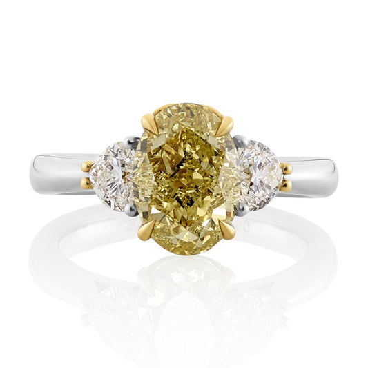 18ct yellow and white gold fancy yellow oval and heart shaped diamond trilogy ring