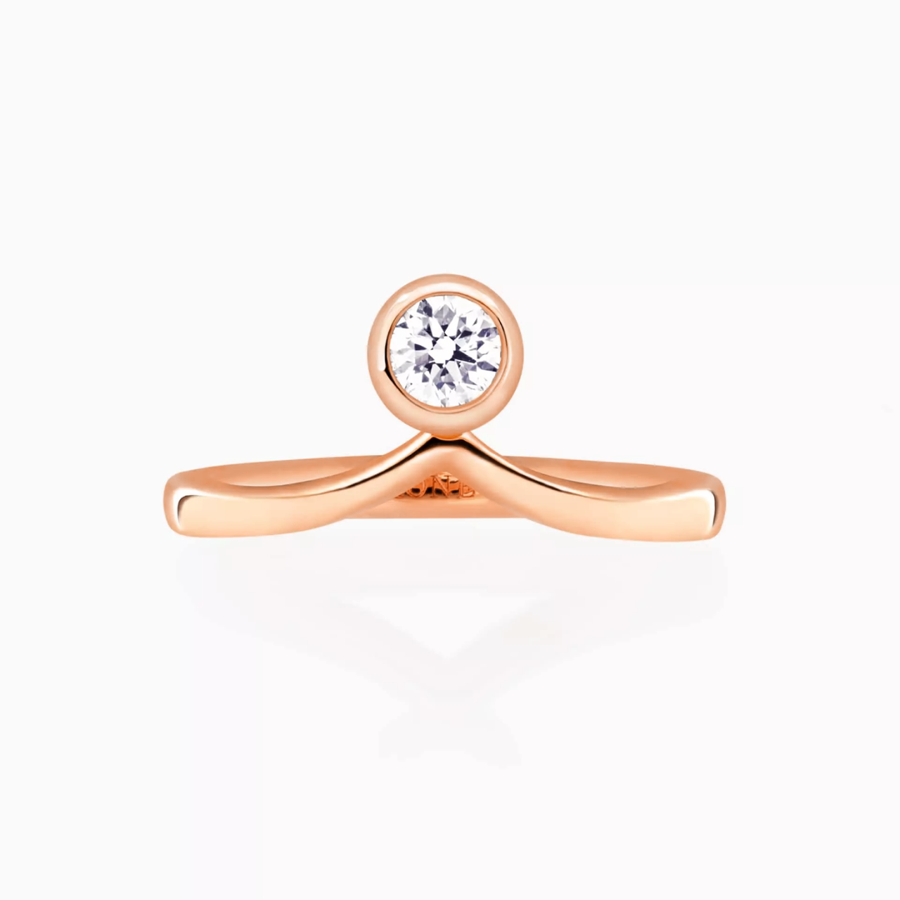 18ct rose gold round brilliant cut diamond bezel set ring