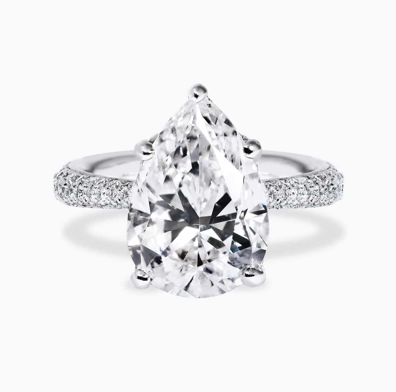 18ct white gold pear and round brilliant cut diamond ring