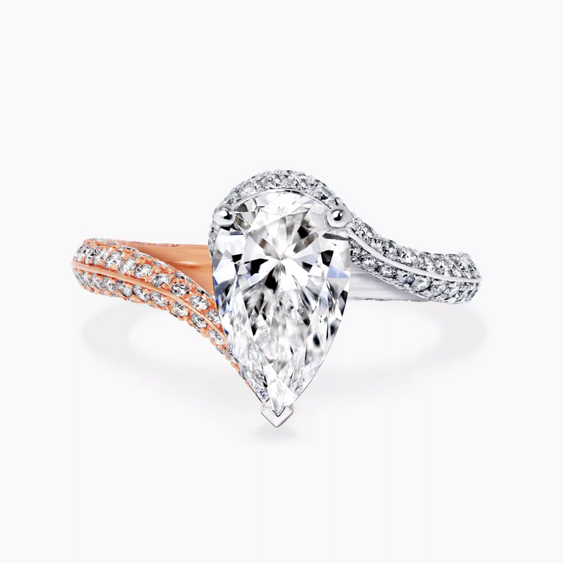 18ct white and rose gold pear and round brilliant cut diamond knife edge ring