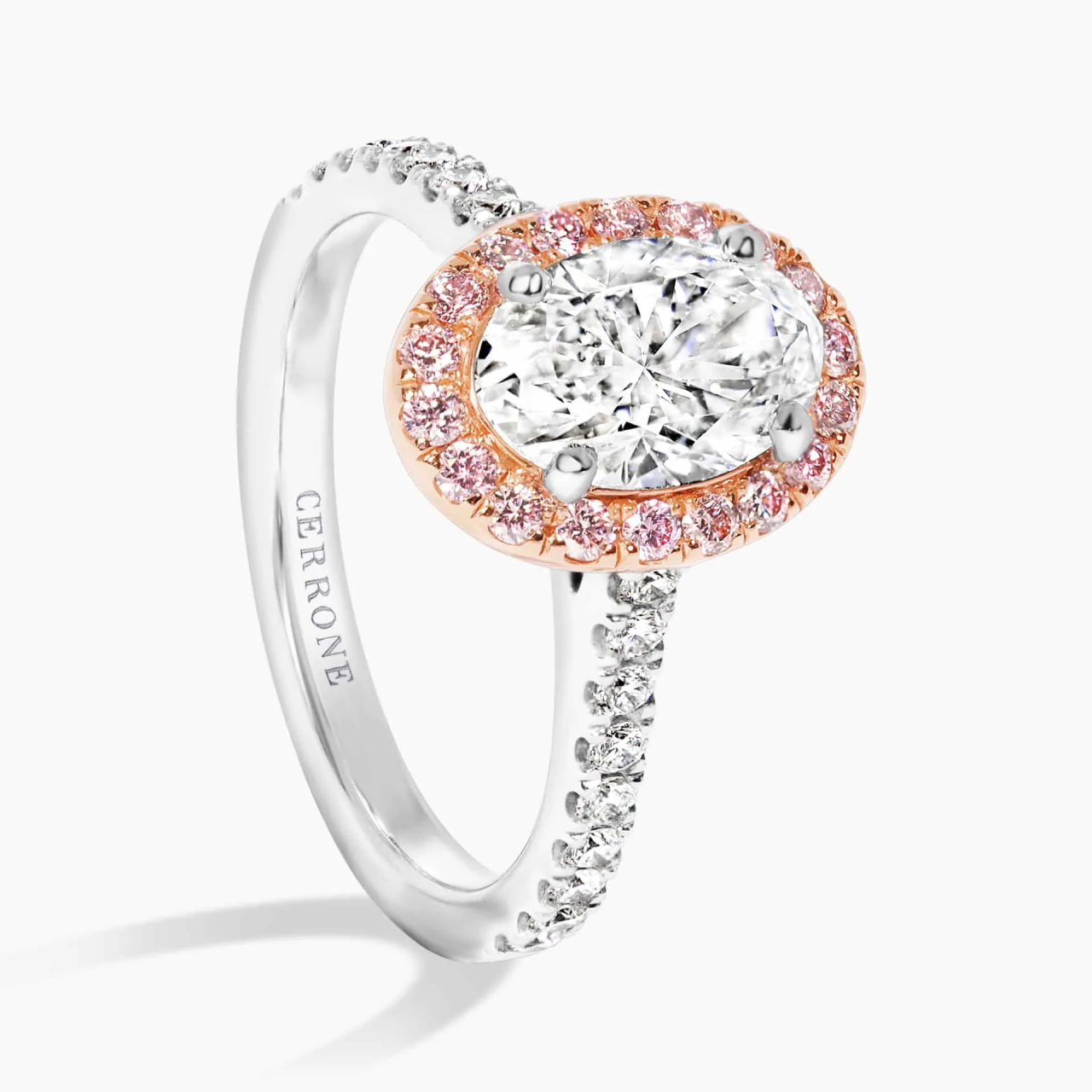 18ct rose and white gold oval and round brilliant cut diamond halo ring