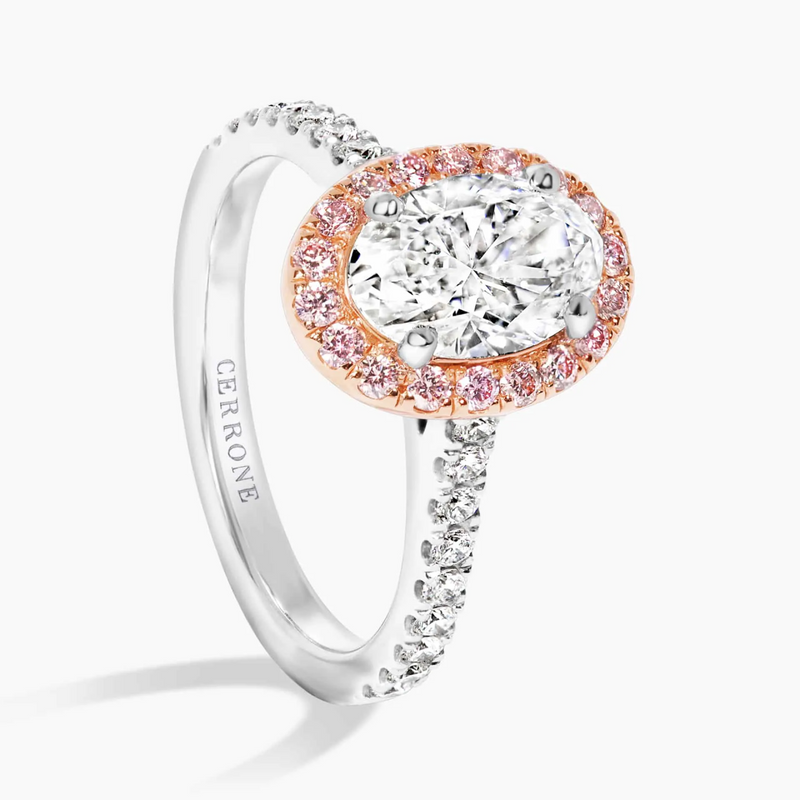 18ct rose and white gold oval and round brilliant cut diamond halo ring side profile