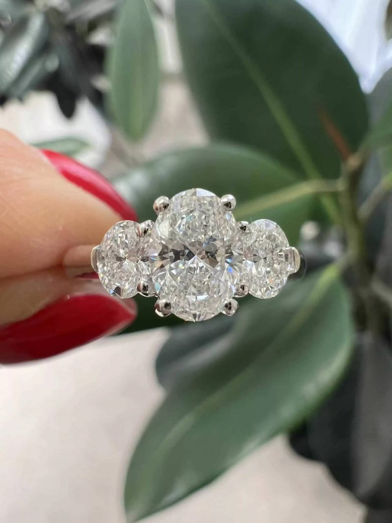 18ct white gold oval cut diamond three stone ring