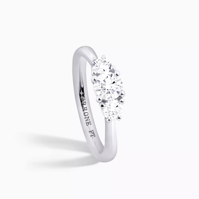 Platinum round brilliant cut diamond trilogy ring side profile