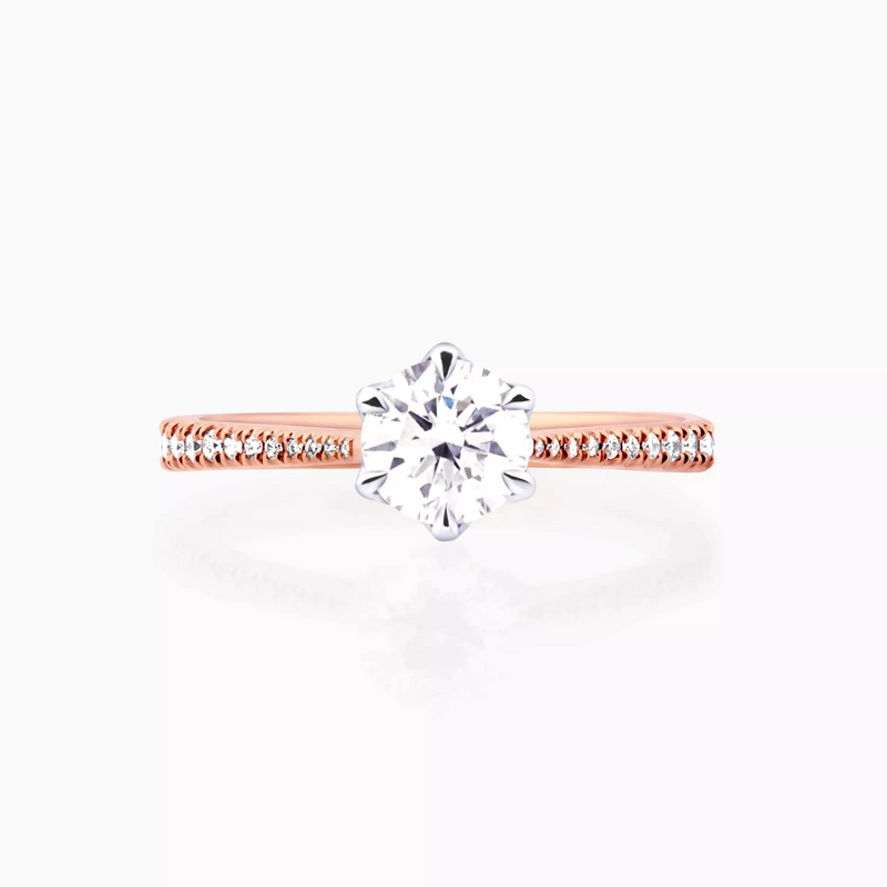 18ct rose and white gold round brilliant cut tulip setting upswept diamond ring