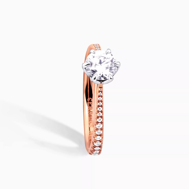 18ct rose and white gold round brilliant cut tulip setting upswept diamond ring side profile