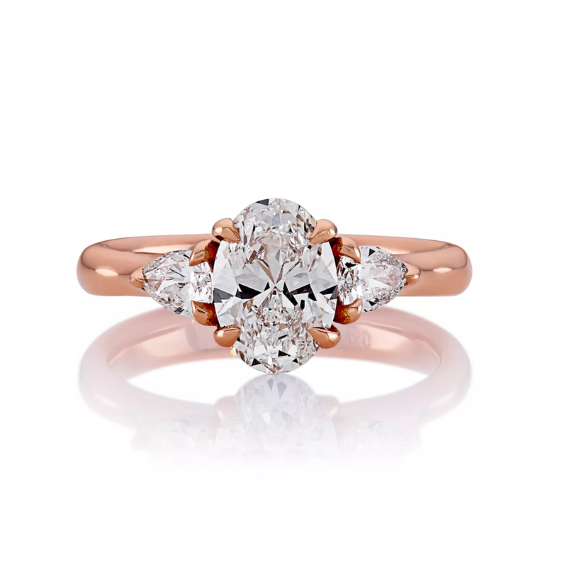 18ct rose gold oval and pear trilogy diamond ring