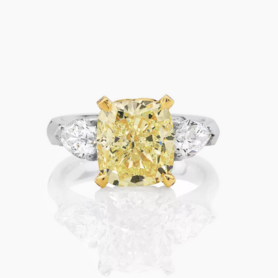 18ct white and yellow gold yellow and white diamond trilogy ring