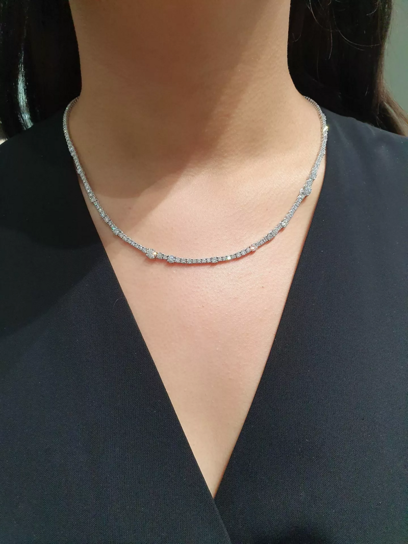 18ct white gold 11.98ct round brilliant cut diamond tennis necklace on the neck
