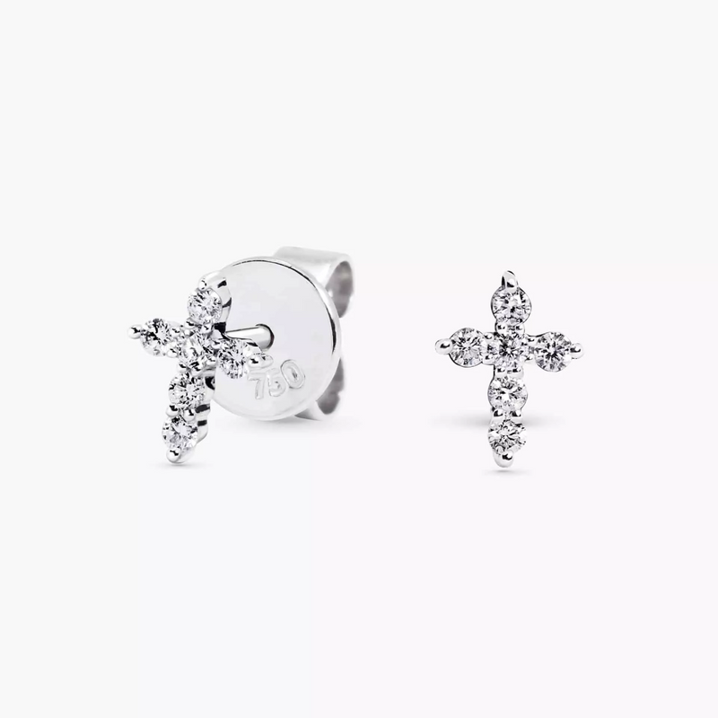 A pair of 18ct white gold diamond claw set cross stud earrings.