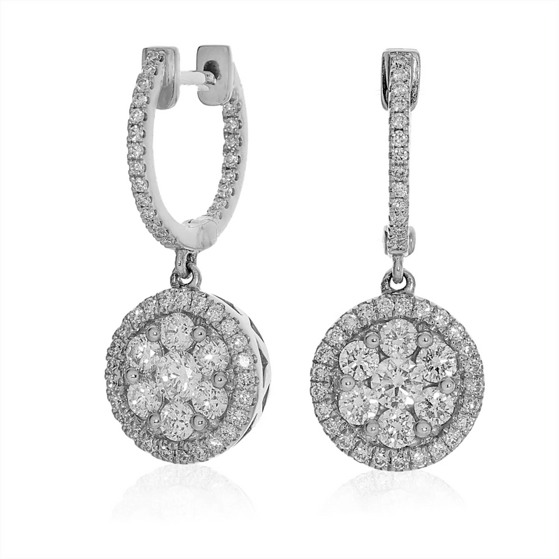 A pair of 18ct white gold diamond cluster set drop earrings.