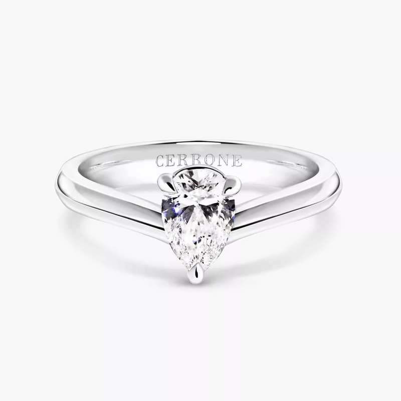 Platinum pear shape diamond solitaire ring