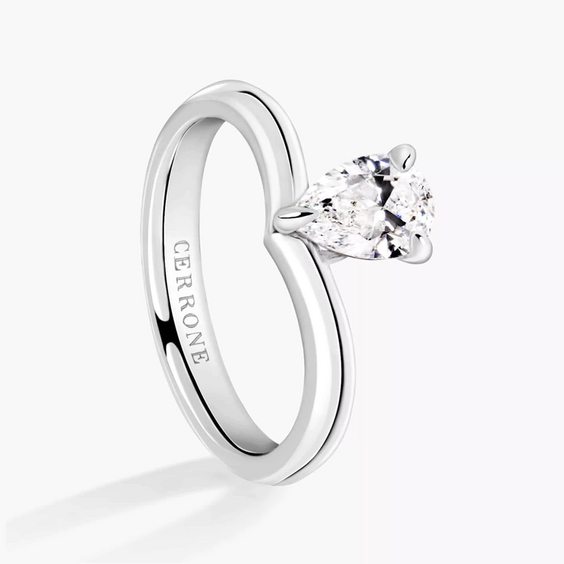 Platinum pear shape diamond solitaire ring side profile
