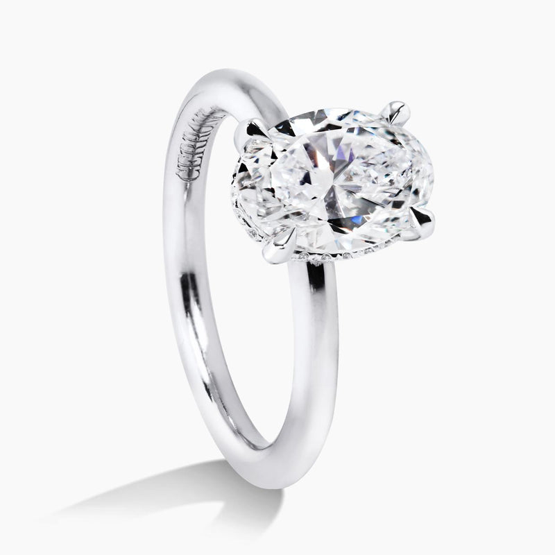 18ct white gold oval brilliant cut claw set diamond hidden halo round band ring