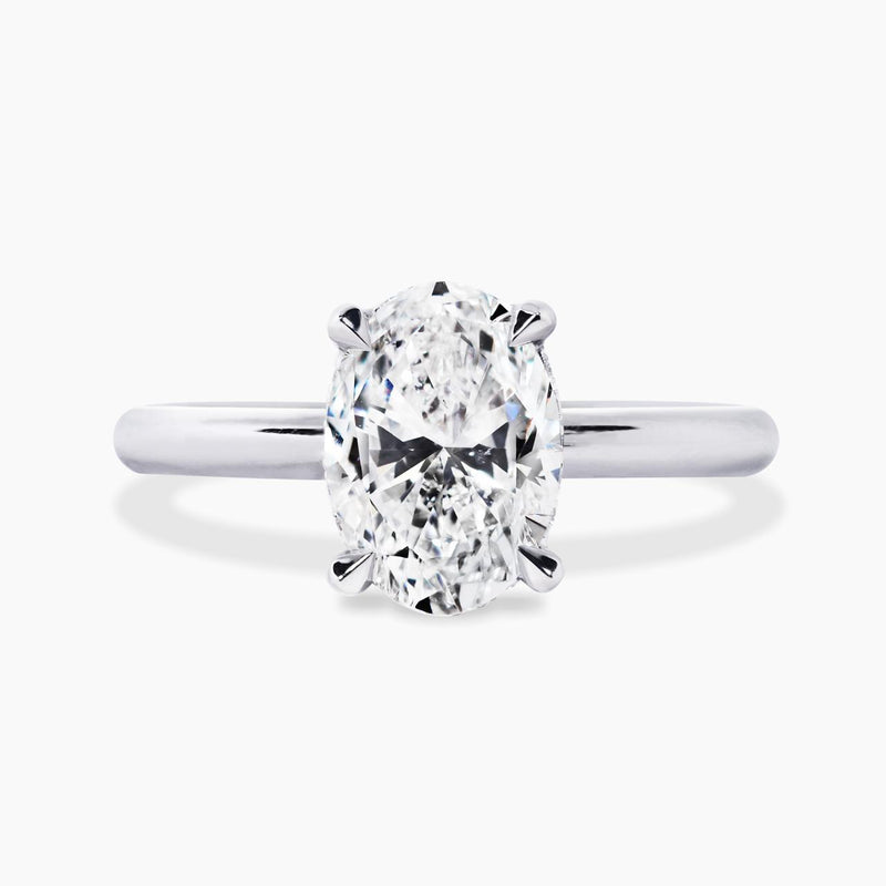 18ct white gold oval brilliant cut claw set diamond hidden halo round band ring