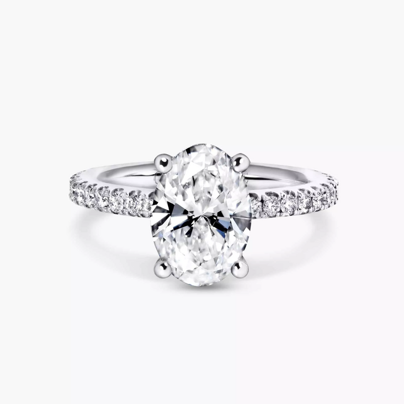 18ct white gold oval brilliant cut lab grown diamond with claw set natural diamond hidden halo and band ring