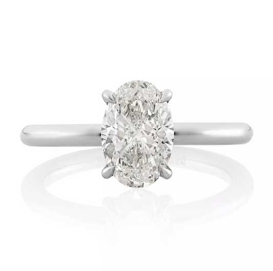 18ct white gold oval diamond hidden halo ring.