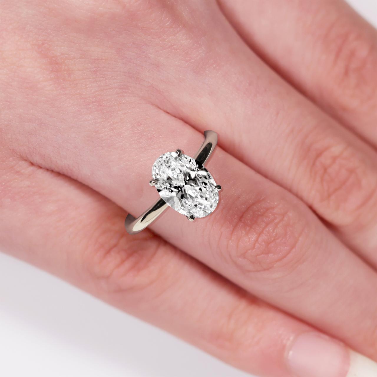 18ct white gold oval diamond hidden halo engagement ring