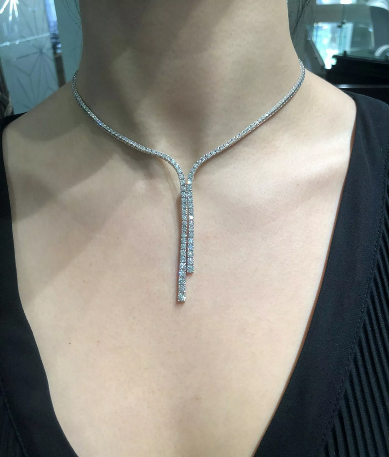 18ct white gold 8.95ct diamond drop tennis necklace on the neck