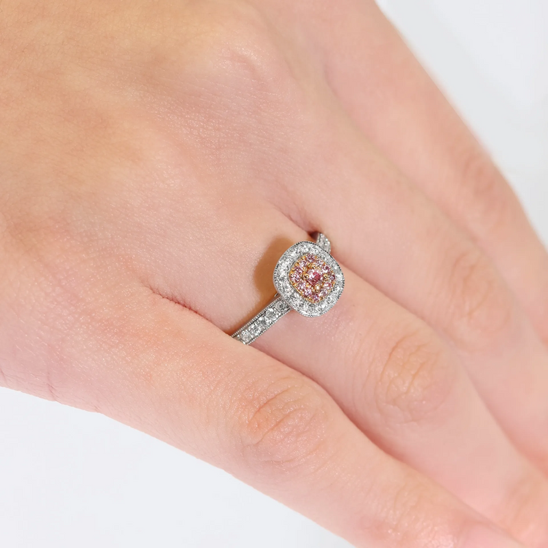 18ct white and rose gold pink and white diamond ring on finger