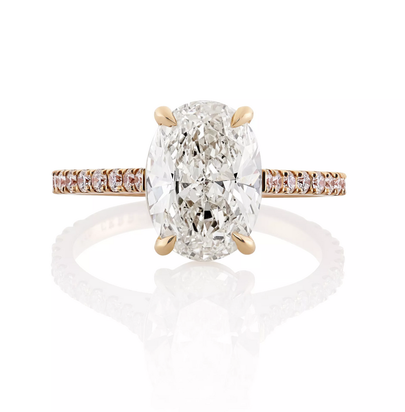 18ct rose gold oval brilliant cut diamond four claw upswept ring
