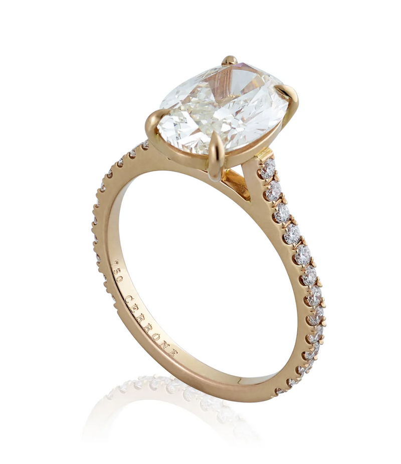 18ct rose gold oval brilliant cut diamond four claw upswept ring side profile