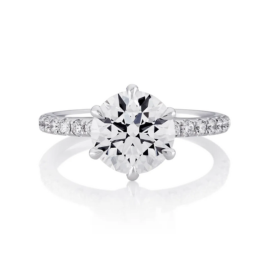 CAPRI DIA - 18ct white gold round brilliant cut diamond six claw diamond ring.