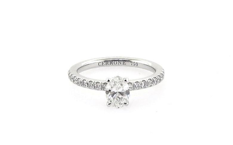 18ct white gold oval and round brilliant cut diamond ring