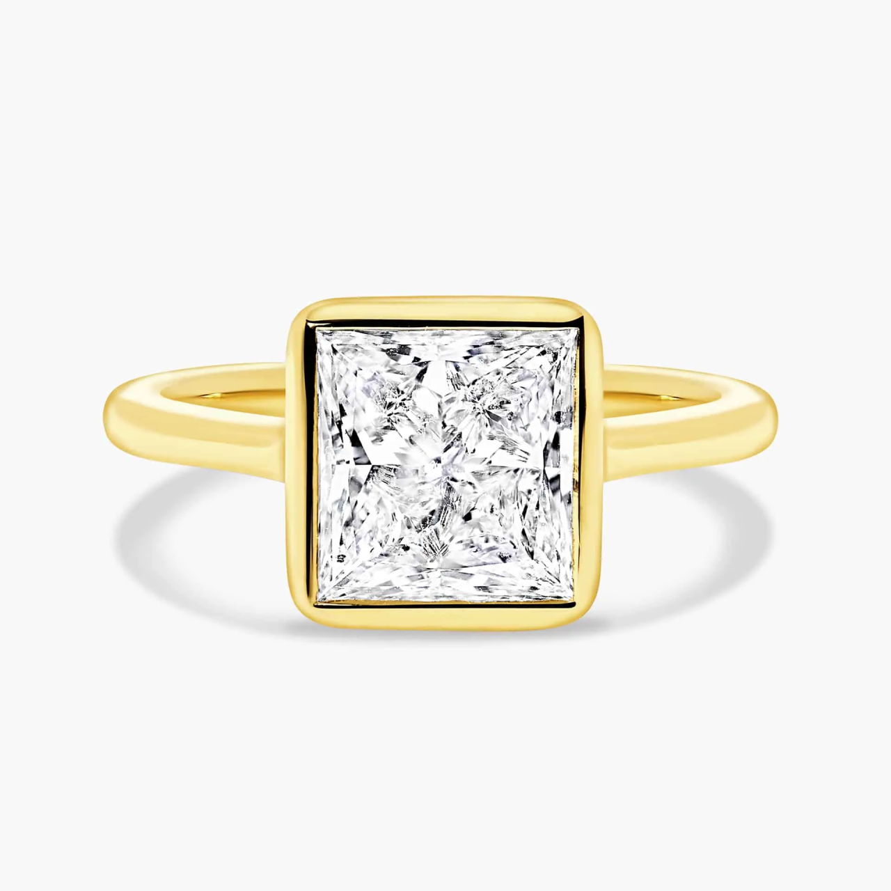PALERMO - 18ct yellow gold princess cut bezel set upswept diamond ring