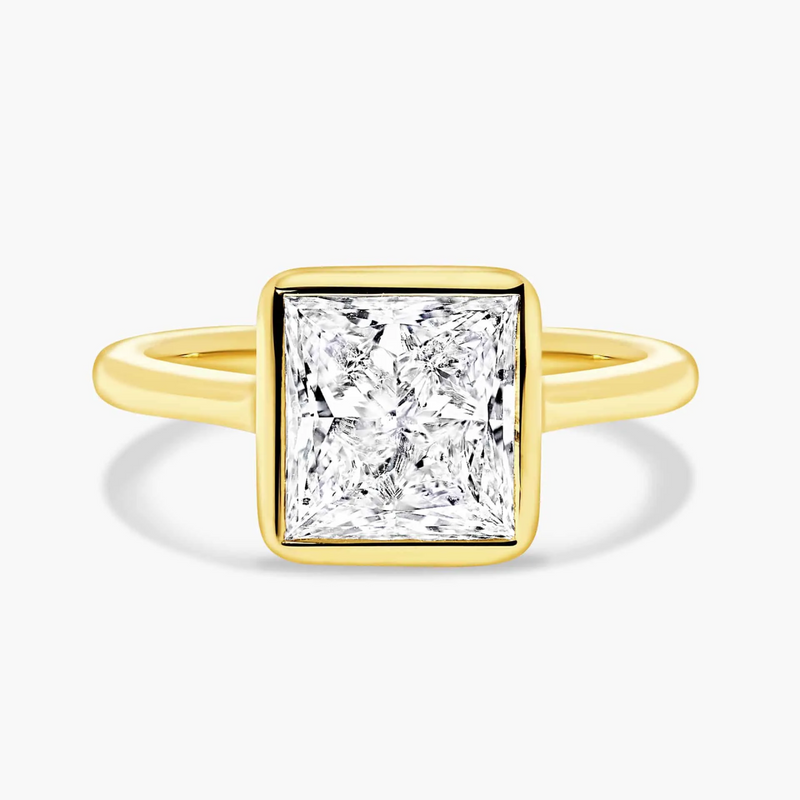 18ct yellow gold princess cut bezel set upswept diamond ring