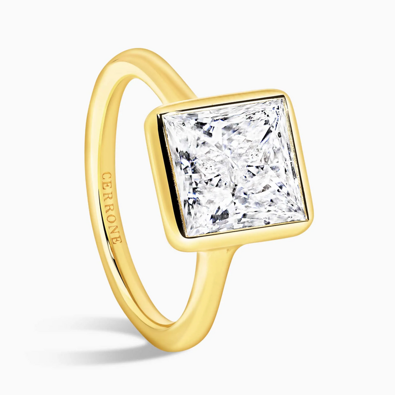 18ct yellow gold princess cut bezel set upswept diamond ring side profile