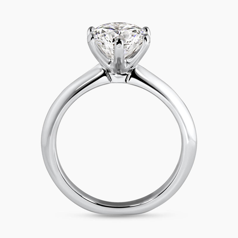 18ct white gold round brilliant cut diamond six claw knife edge solitaire diamond ring side profile
