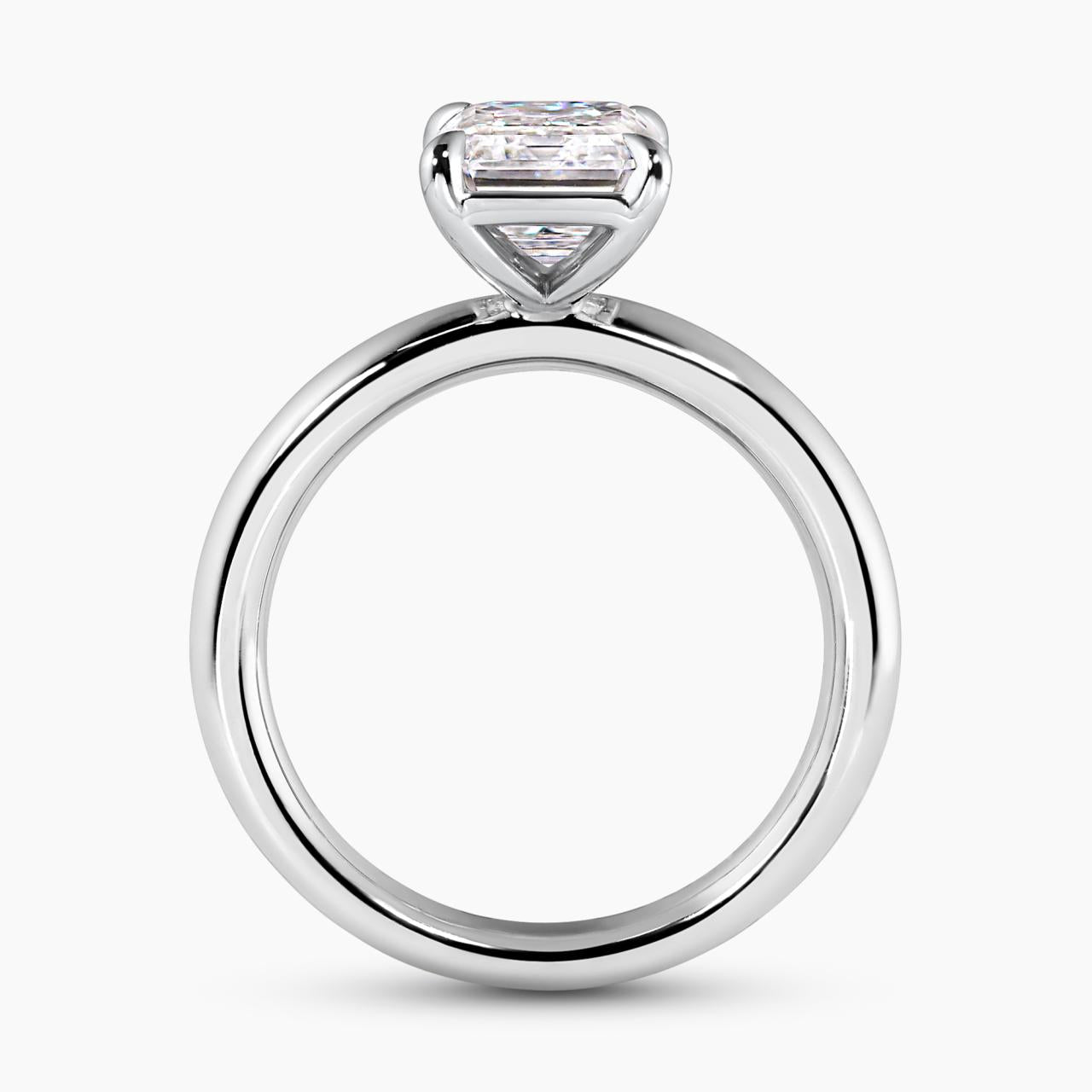 18ct white gold emerald cut diamond solitaire engagement ring in a four claw setting side profile