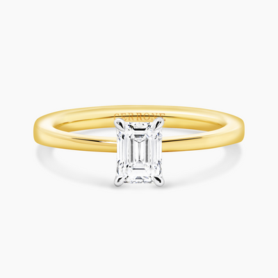 18ct yellow and white gold emerald cut diamond solitaire ring