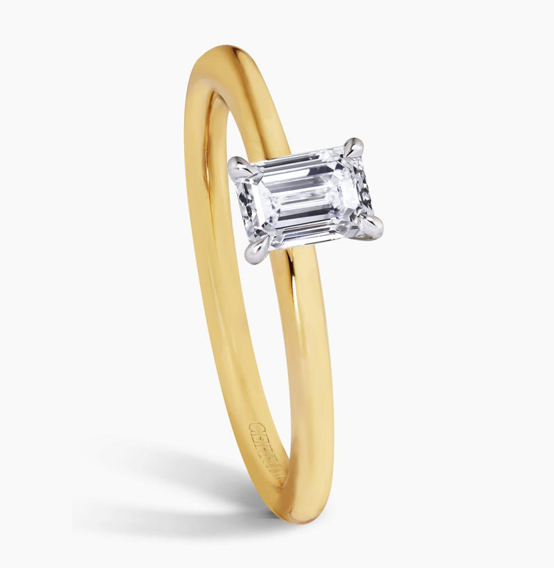 18ct yellow and white gold emerald cut diamond solitaire four claw ring side profile