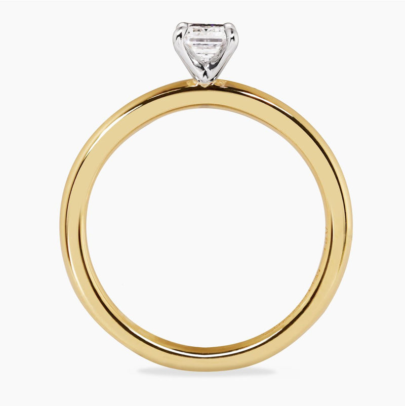 18ct yellow and white gold emerald cut diamond solitaire four claw ring side view