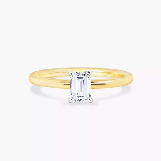 TORINO - 18ct yellow and white gold emerald cut diamond solitaire four claw ring