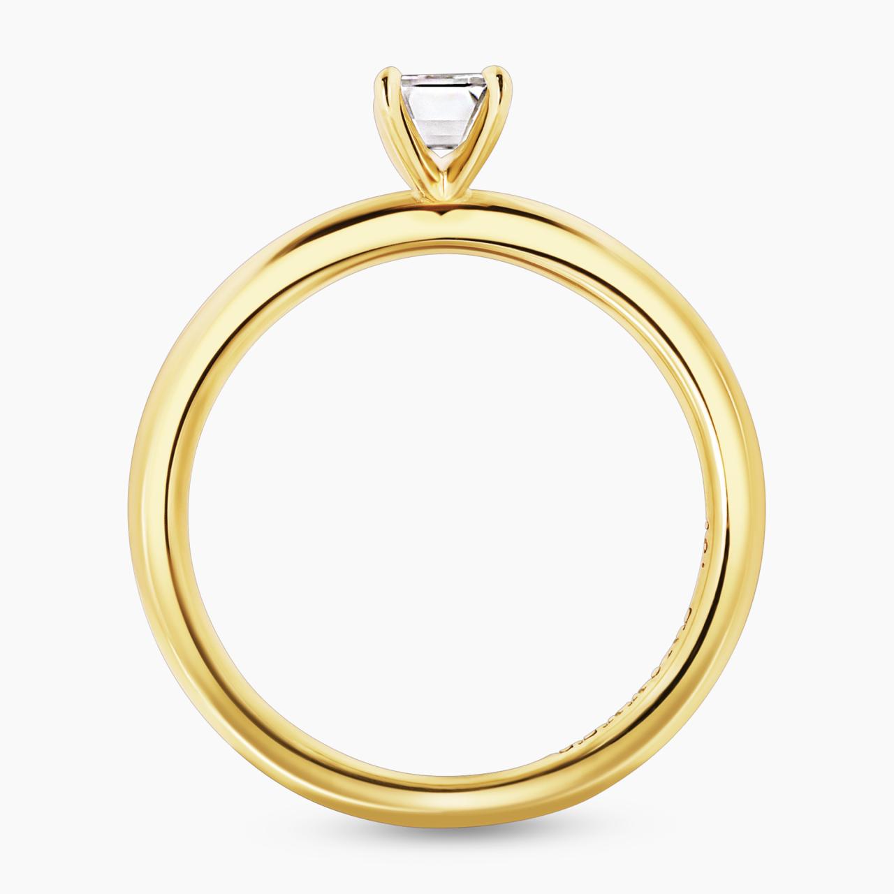 18ct yellow gold 0.50ct emerald cut solitaire ring in a four claw setting side profile