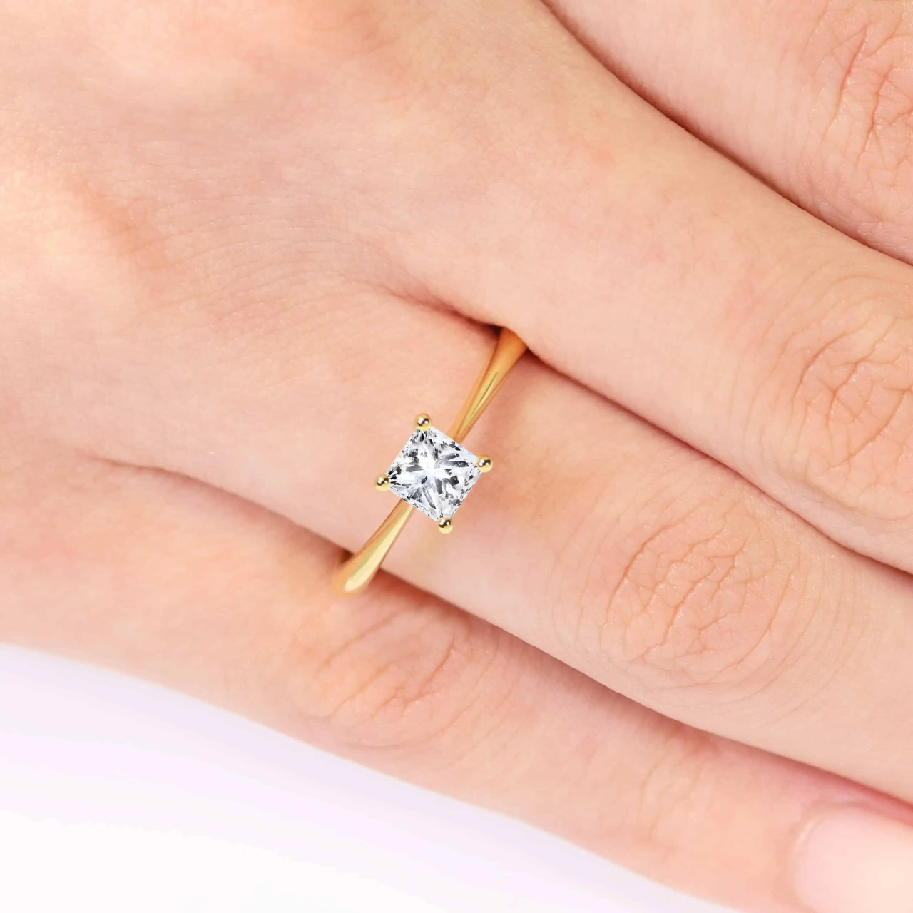 TORINO SIDE V - 18ct yellow gold cushion cut four claw side v setting diamond ring