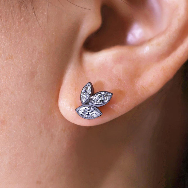 18ct white gold marquise cut diamond leaf design stud earrings on ear