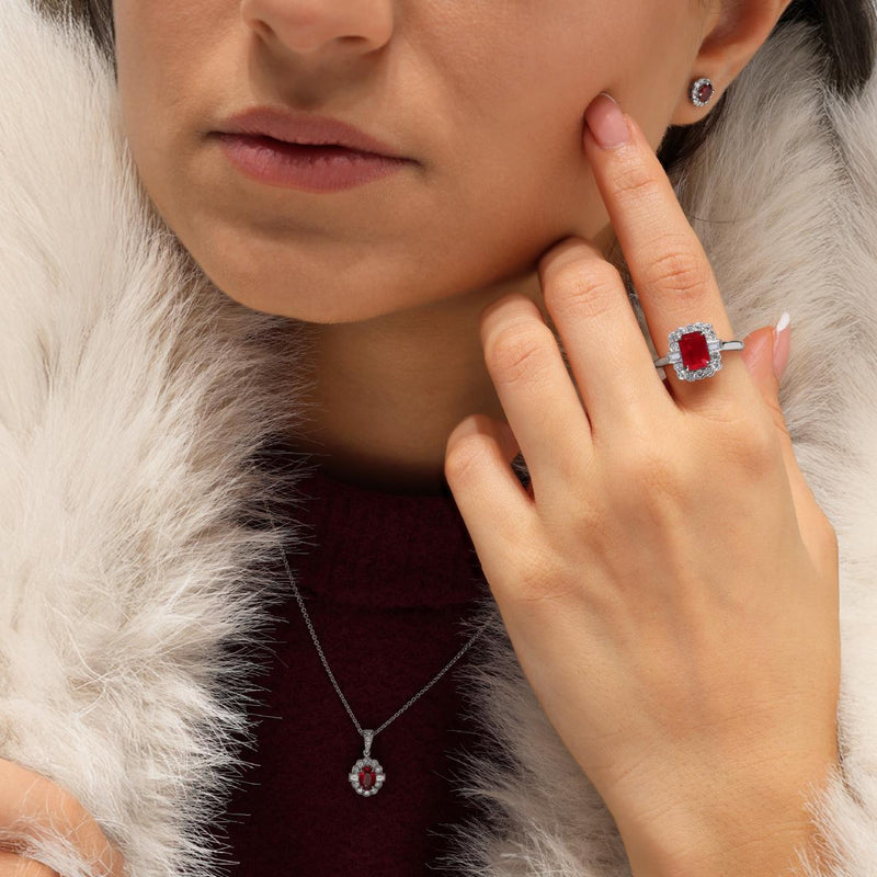 18ct white gold oval ruby and diamond necklace on neck