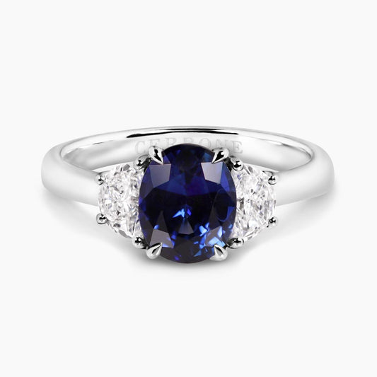 Platinum oval brilliant royal blue sapphire and diamond ring