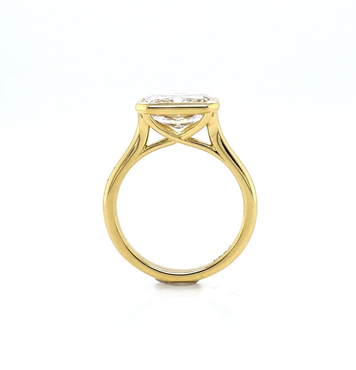 18ct white gold 1.94ct elongated radiant cut lab grown diamond bezel set solitaire ring