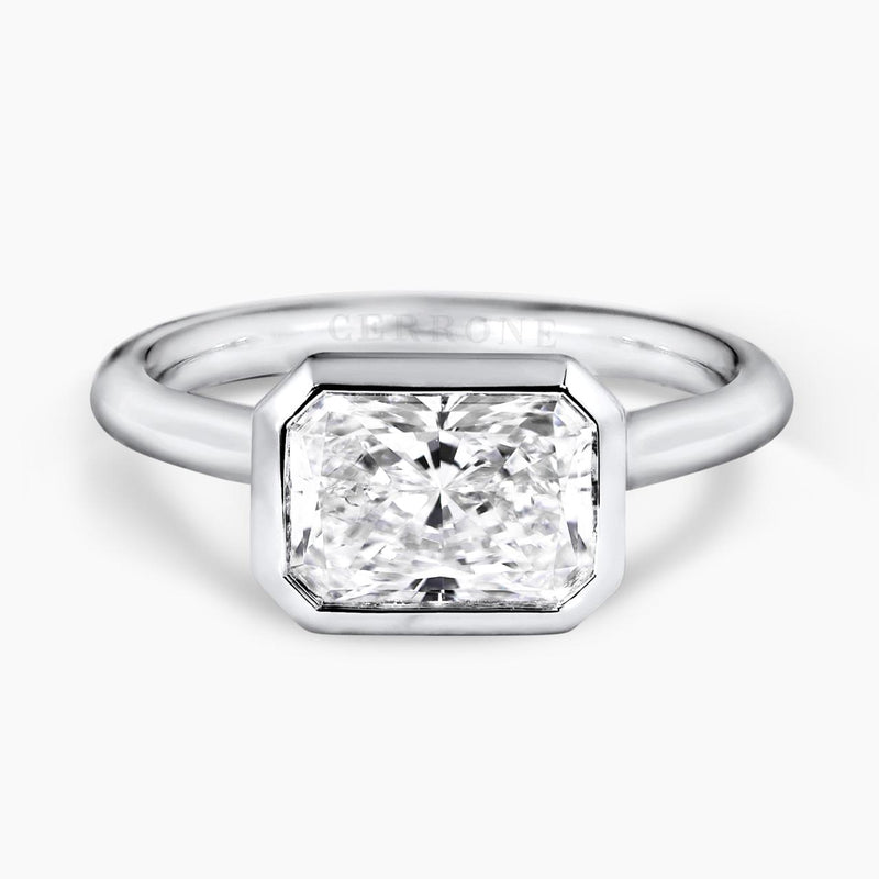 18ct white gold elongated radiant cut lab grown diamond bezel set solitaire ring
