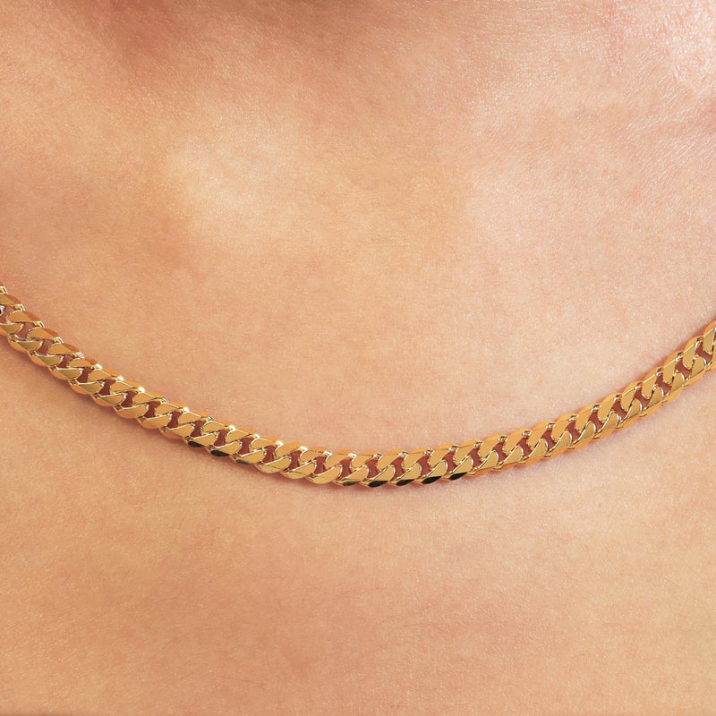 18ct yellow gold 60cm solid flat curb link chain on the neck