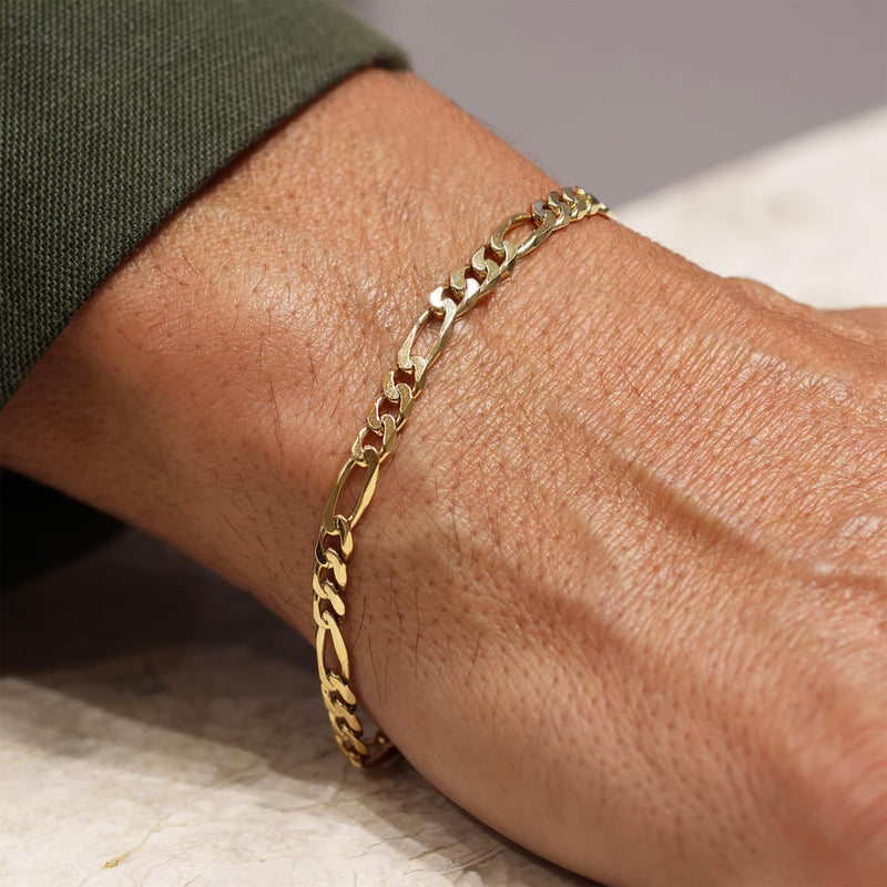 18ct yellow gold 21cm figaro link men's bracelet with parrot clasp on the wrist